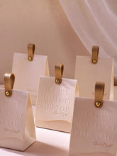 Load image into Gallery viewer, Custom Ivory Elegant Candy Gift Bags – Wedding Favors with Handle & Optional Gold Foil Logo