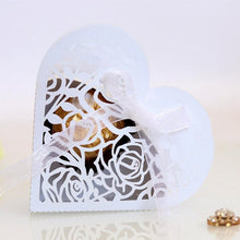 Load image into Gallery viewer, 50pcs Love Heart Laser Cut Hollow Carriage Favors Gifts Flower Candy Dragee Boxes with Ribbon Baby Shower Wedding Party Supplies
