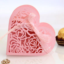 Load image into Gallery viewer, 50pcs Love Heart Laser Cut Hollow Carriage Favors Gifts Flower Candy Dragee Boxes with Ribbon Baby Shower Wedding Party Supplies
